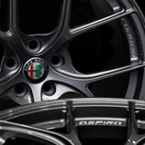 Aspira AV-5 gun metal close view of alfa romeo, aspira, and forged logo